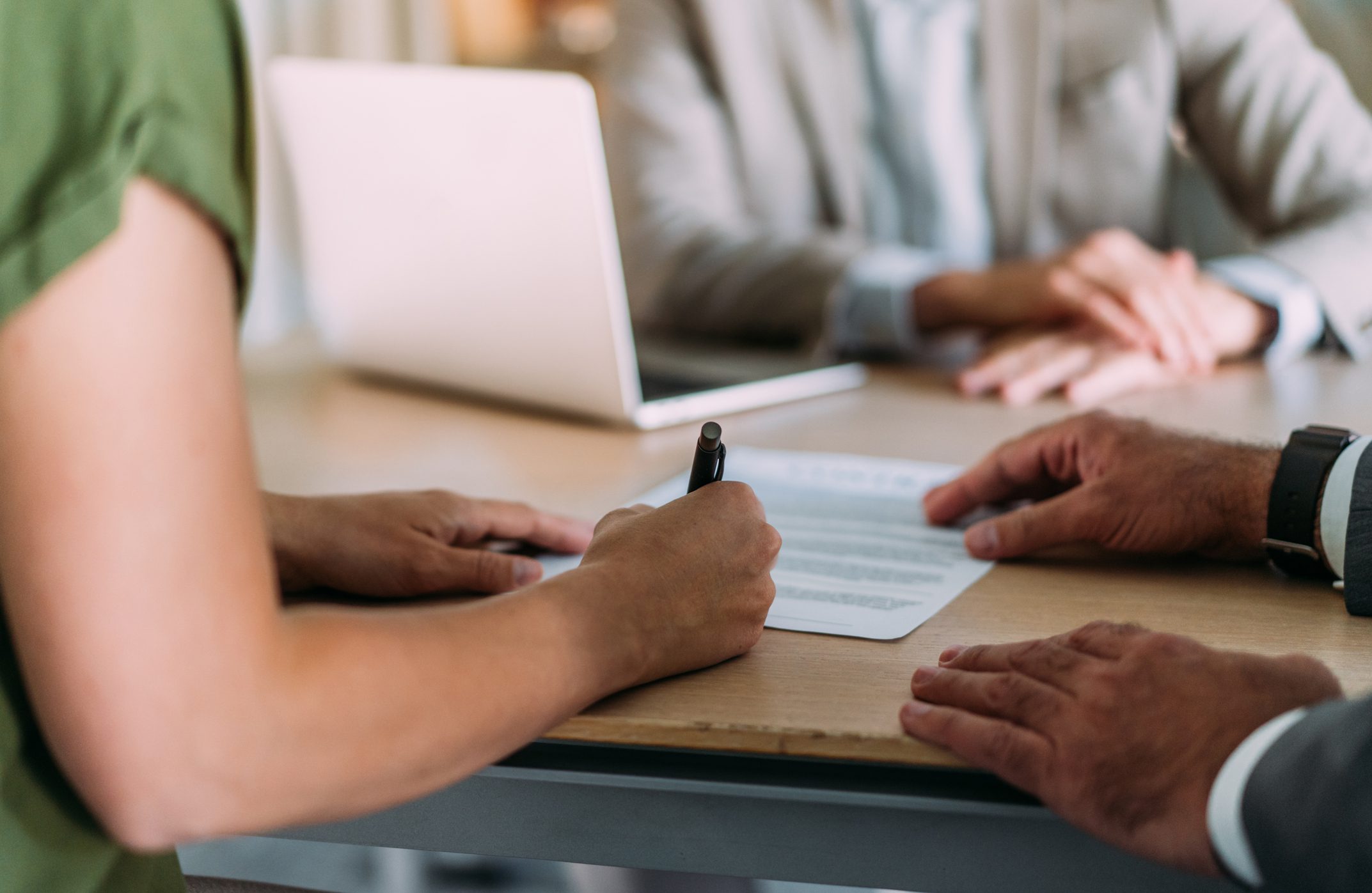 People reviewing paperwork together