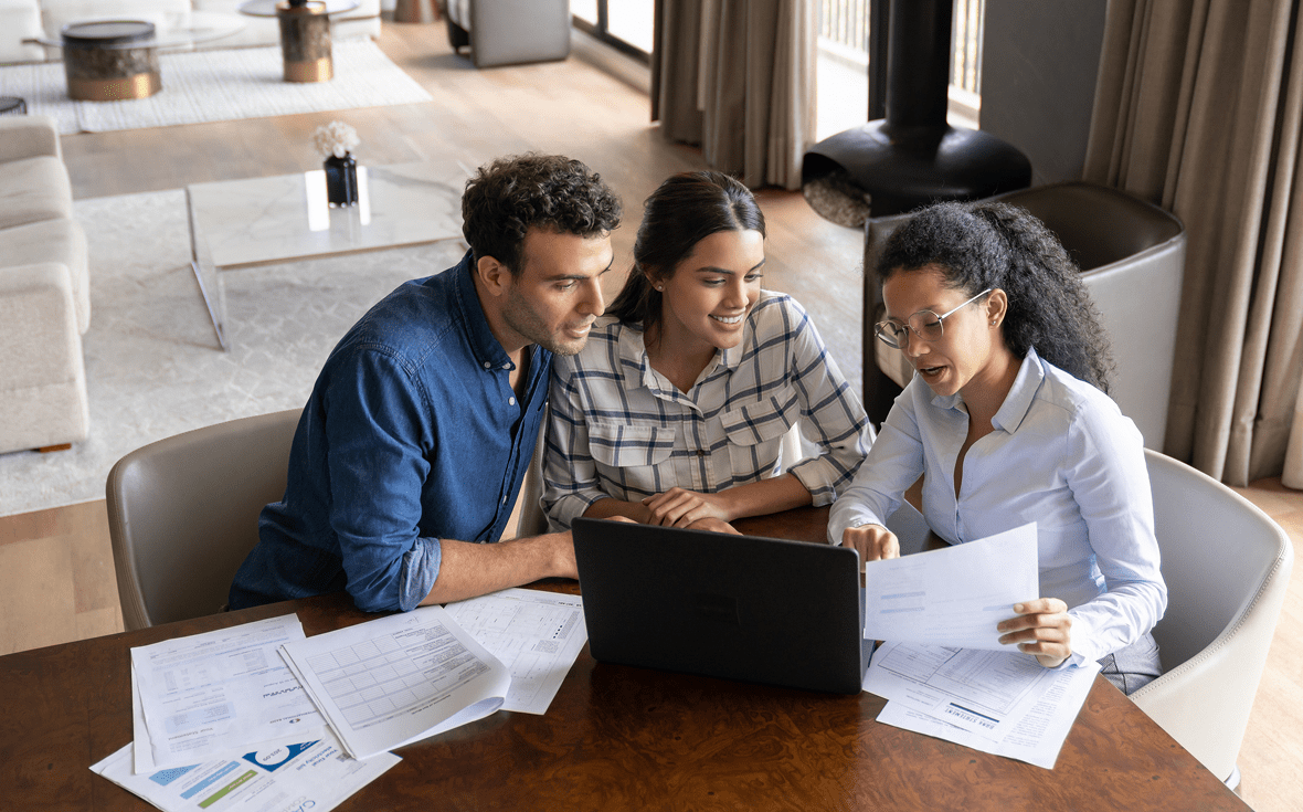 Team reviewing documents at a table