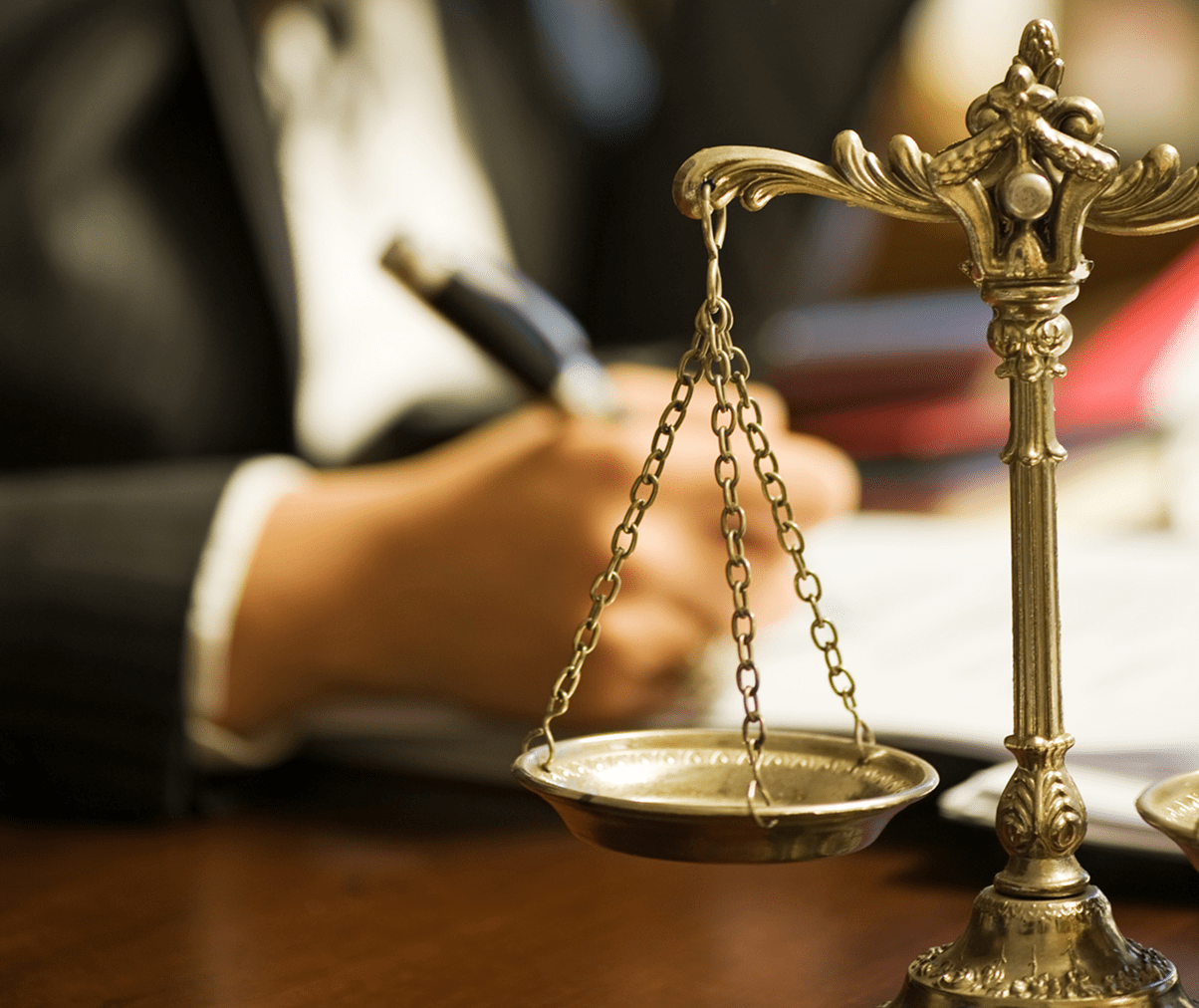 Legal professional working with justice balance